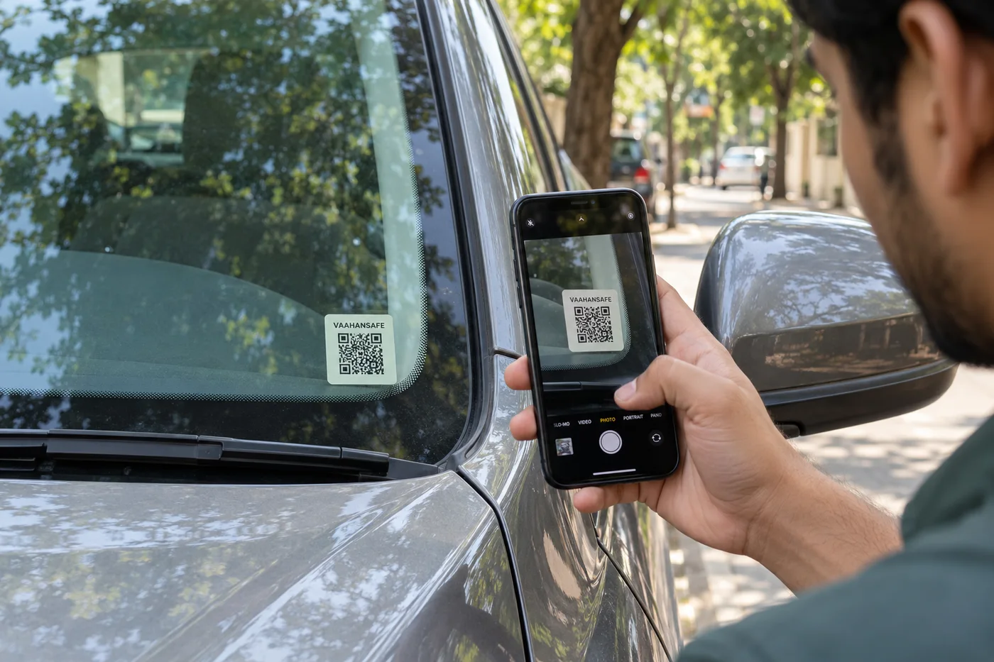 Illustration of a phone scanning a VaahanSafe QR on vehicle glass